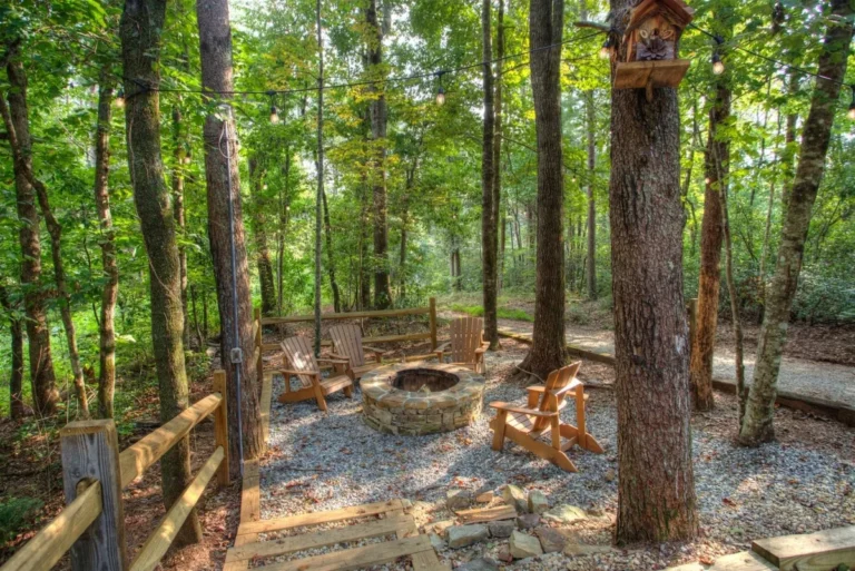 Stacked rock fire pit with split rail fence at Fox Ridge cabin near Helen GA